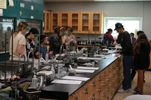 Attendees at the Onizuka Space Science Day try out science experiments inside a classroom in the Chemistry Building at El Camino College on Saturday, March 16. (Joseph Ramirez | The Union)