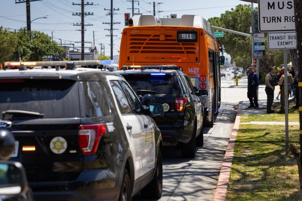 Los Angeles County Sheriffs assist in an emergency distress call coming from the metro line that runs through Crenshaw and Redondo Beach Boulevards on Monday, April 29. The call was in response to an elderly woman on the bus threatening and physically pushing passengers and the driver. (Ethan Cohen | The Union)