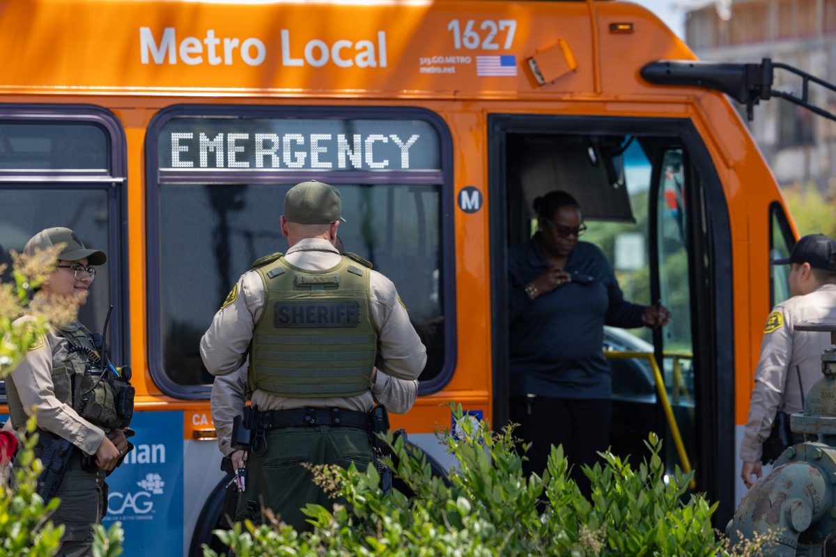 Los+Angeles+County+Sheriffs+assist+in+an+emergency+distress+call+from+the+Metro+Line+that+runs+through+Crenshaw+and+Redondo+Beach+Boulevards+on+Monday%2C+April+29.+The+call+was+in+response+to+an+elderly+woman+on+the+bus+threatening+and+physically+pushing+passengers+and+the+driver.+%28Ethan+Cohen+%7C+The+Union%29