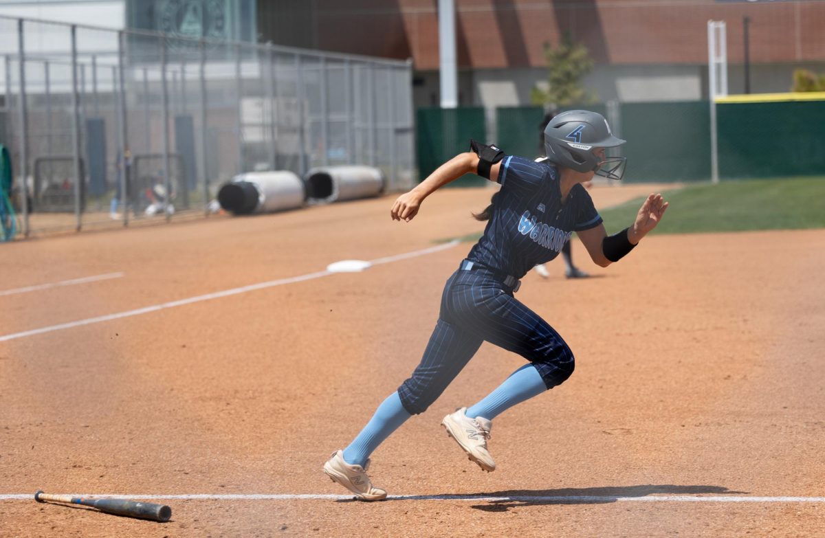 Number+4+Warrior+Emma+Garcia+makes+a+sprint+toward+first+base+after+connecting+with+a+pitch+from+the+opposing+Fullerton+Hornets+early+in+the+first+inning+of+the+Saturday%2C+April+20+home+softball+game.+Another+hit+from+Warrior+infielder+Malia+Martin+would+see+Garcia+advance+to+second+base+before+the+end+of+the+inning+saw+Warriors+with+three+outs+and+no+scores.+%28Delfino+Camacho+%7C+The+Union%29