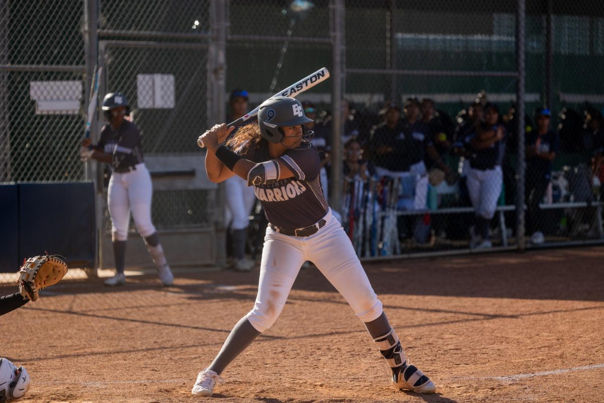 El Camino infielder Cheyenne Navarro readies herself for a pitch during the final innings of a softball game against Compton College on Tuesday, April 23. (Monroe Morrow | The Union)