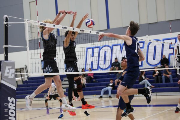 Moorpark College middle blocker John Singh looks at the ball and attempts a block from El Camino College setter Jacob Flanagan’s strike during the men’s volleyball game at the ECC Gym Complex on Wednesday, April 4. The Moorpark Raiders won 3-0. (Ma. Gisela Ordenes | The Union)