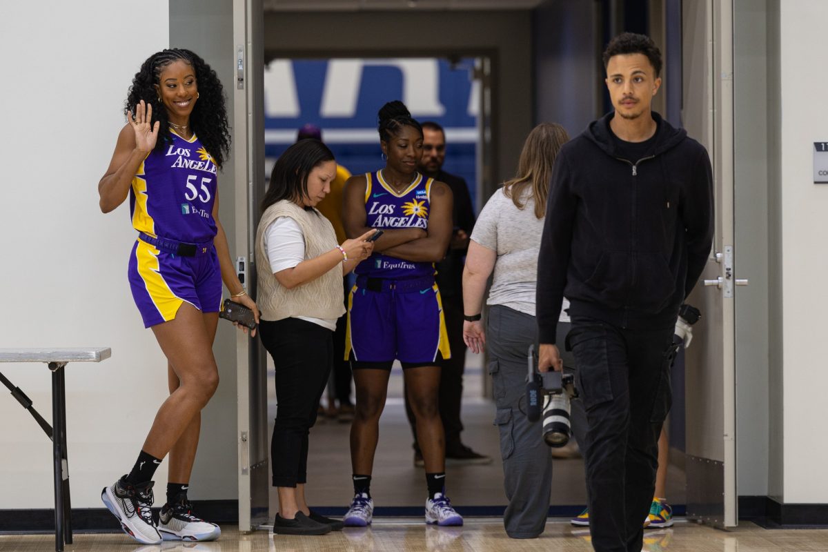Los Angeles Sparks forward Monique Billings, left, and guard Aari McDonald, middle, prepare to speak to the media in El Camino College’s Gymnasium on Wednesday, May 1. The Sparks rent the Gymnasium as the site for their training camp for the 2024 WNBA season. El Camino College is considering increasing facilities rentals as one of the revenue-generating strategies to address the $20-million budget deficit. (Ethan Cohen | The Union)