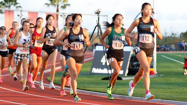 Ami Jacobson (far right), Marbella Flores, and Sequoia Gonzales lead the pack during the women's 5,000-meters at the CCCAA track and field state championship Flores took home a state title in the distance event, while Gonzales placed third, Jacobson in seventh. (Greg Fontanilla | The Union)