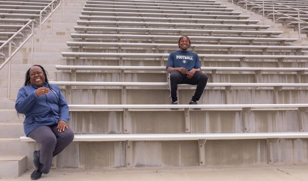 Sharonda and Barksdale share a laugh while sitting on the El Camino College bleachers on April 25. (Delfino Camacho | Warrior Life)