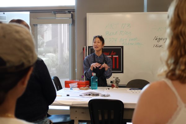 Professor Irene Mori shares the agenda for the day with her students on Friday, March 29 at El Camino College. (Jamila Zaki | Warrior Life)