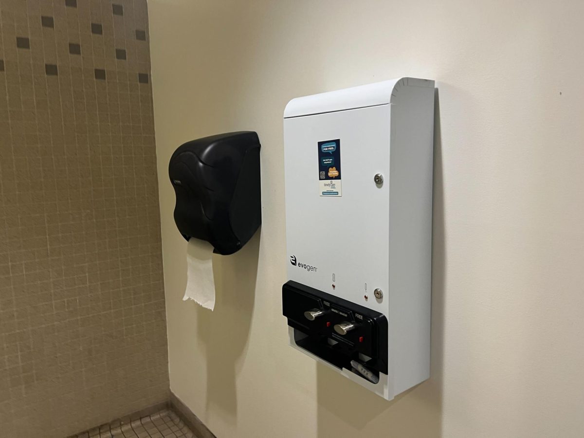 Students can get free menstrual products from women’s bathroom dispensers at El Camino College. This dispenser was found in the bathroom of the Humanities Building on the first floor. (Kae Takazawa | The Union)