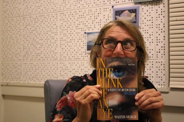 Almo in her office located in the Music building on Tuesday April 16. “In the Blink of an Eye” is a 1992 non-fiction filmmaking book on the art and craft of editing. This is one of the several books Almo keeps in her office.