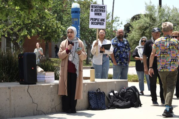 El Camino students gather around outside of the Social Justice Center to speak and peacefully protest in regards to the conflict between Israel and Hamas on May 21. (Nick Miller | The Union)