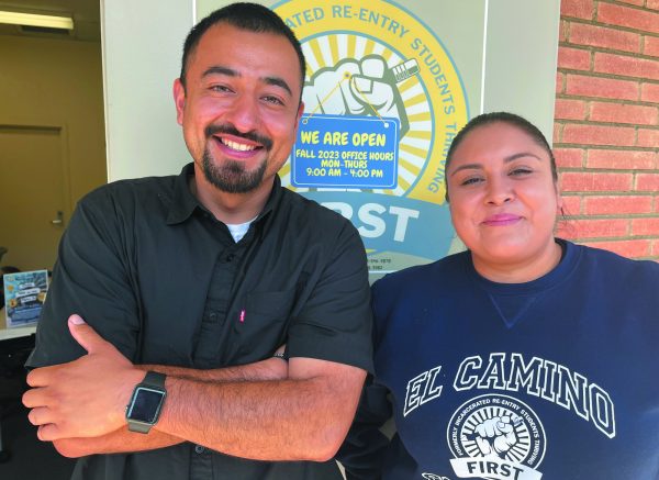Francisco Lopez, coordinator of El Camino’s Formerly Incarcerated Students Thriving (FIRST) Program, (left) and FIRST counselor Isabel Gonzalez work with system impacted students. “I learned what a warrior meant based on what my relatives did...sacrificing your well-being to make sure that the people you love are being taken care of,” Lopez says. (Kim McGill | Warrior Life)