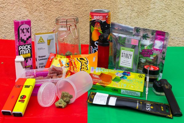 A photo illustration shows a wide variety of marijuana products including marijuana flower, joints, concentrated wax, vapes and edibles. The products on the right were purchased at licensed dispensaries and the products on the left were purchased in unlicensed dispensaries. There is a difference in both pricing and quality when it comes to the products. (Photo illustration by Monroe Davis | The Union)