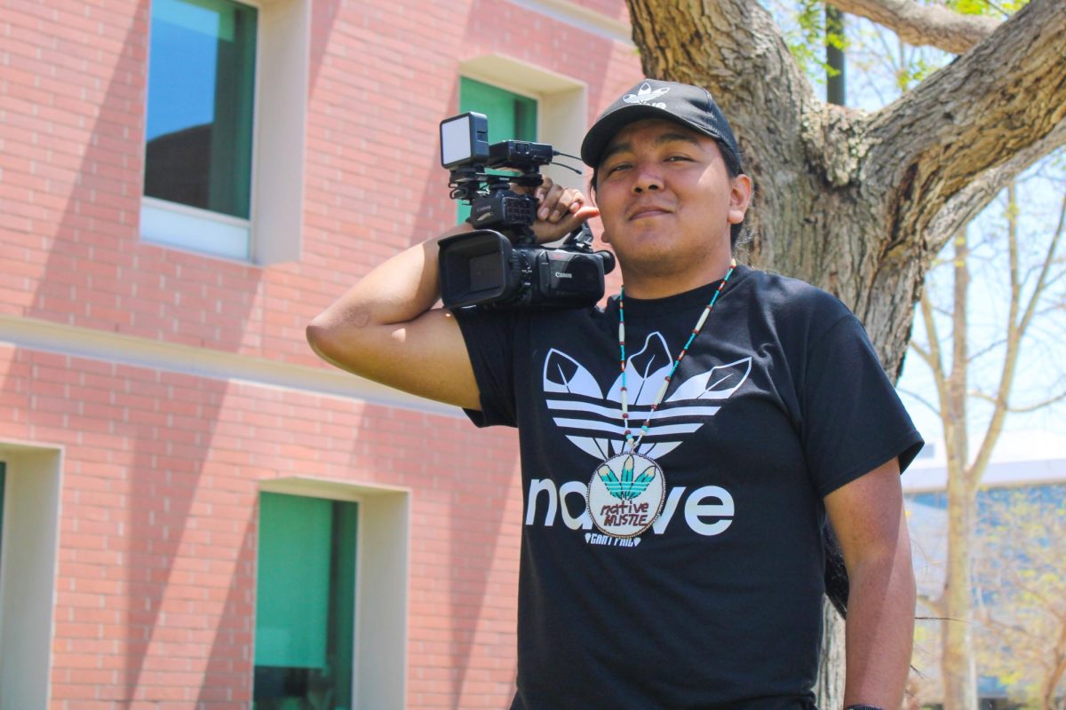 El Camino College film major Tyler Notah is a content creator with over 44,000 followers on his TikTok channel @native.hustle. Notah, who is Diné, sings and drums at powwows for the Wildhorse Singers as part of the Wildhorse Native American Association. (Elsa Rosales | Warrior Life)