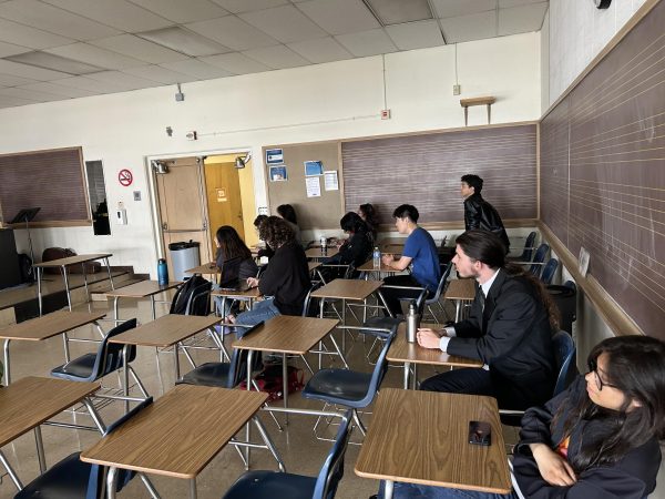 A view of the entire room from the Society of Music club's meeting on Thursday, May 16. The members are listening to their colleague Slade give her presentation on goth rock music. (Tommy Kallman | The Union)