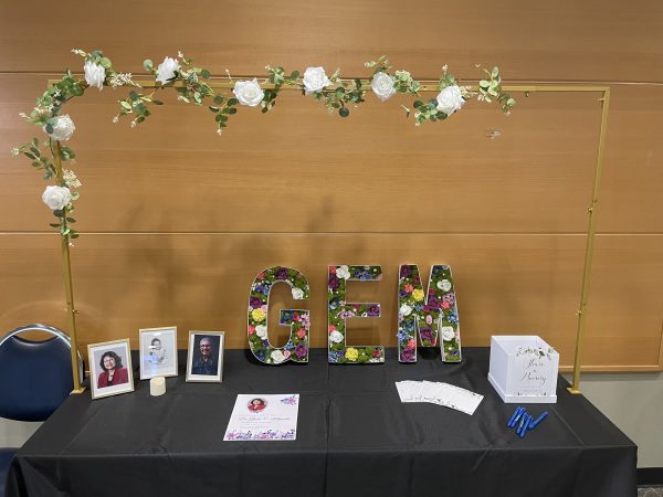 A memorial table was set up at the celebration of life for Dr. Gloria E. Miranda in the East Dining Room on Wednesday, May 8. The table included memory cards that attendees could fill out with their recollections of Dr. Miranda.