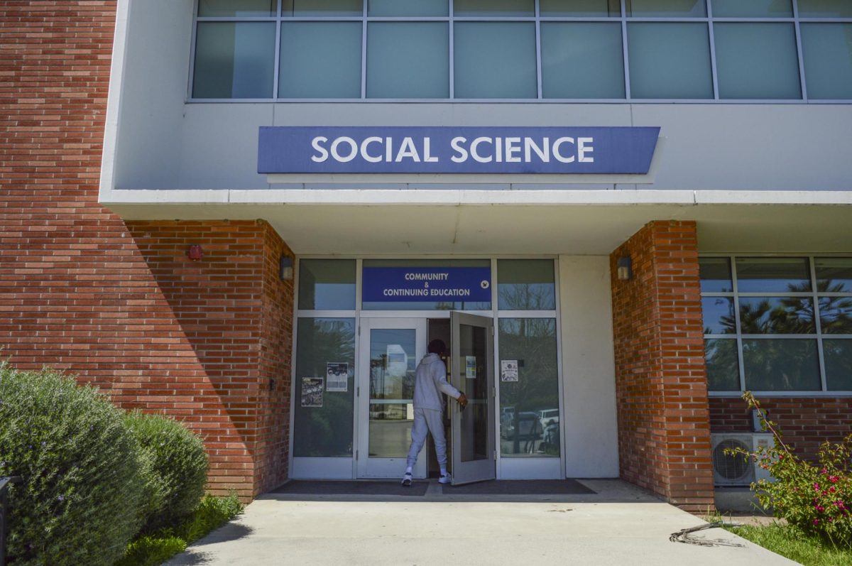 A student walks into the Social Science Building on Monday, April 29. The Community & Continuing Education Office has officially moved to the Social Science Building and can be found on the first floor in Room 101. (Clarence Davis | The Union)