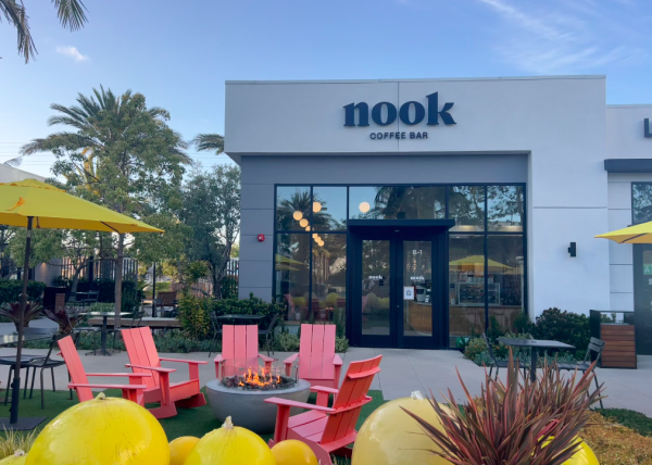 The fire pit is lit outside of Nook Coffee Bar on April 24