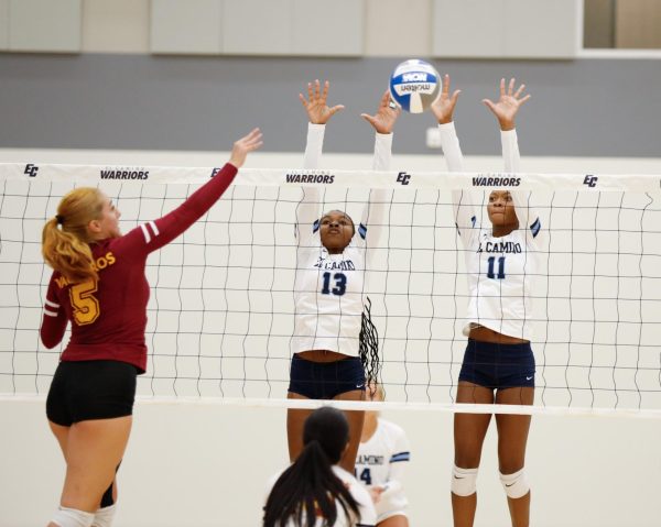 El Camino opposite hitter Payton Garrison and middle blocker Aireon Scott block an attack by Karina Biel at the El Camino Gymnasium on Friday, Aug. 23. The Warriors will be on the road at Bakersfield College at the Bakersfield Quad for a doubleheader against Santa Barbara at 10 a.m. and will face Bakersfield at 2 p.m. (Greg Fontanilla | The Union)