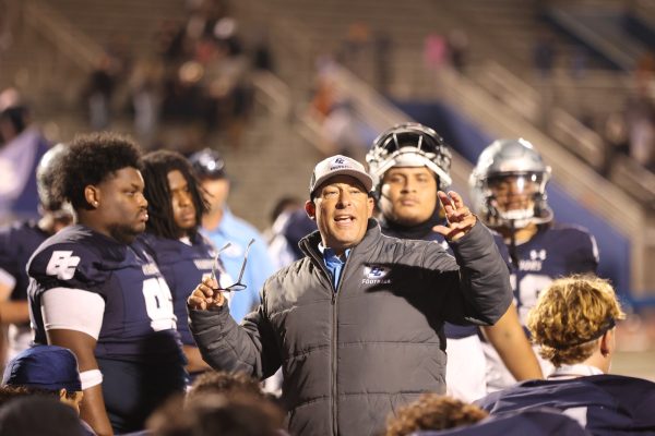 El Camino Warriors coach Gifford Lindheim speaks to his team after a 14-10 loss in their home opener to the Palomar Comets at Featherstone Field on Saturday, Sept. 14. "