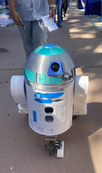 An R2-D2 unit created by the Robotics Club strolls its way down the walkway at Club Rush on the Library Lawn on Wednesday, Sept. 11.