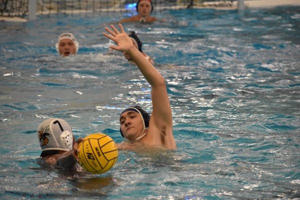 Warrior utility Brayden Sanchez blocks Fullerton utility Brandon Santamaria from passing the ball to his teammate. Sanchez tallied one goal, three assists, one steal, one extra goal, and a total of two shots. (Elliott Bullock II |The Union)