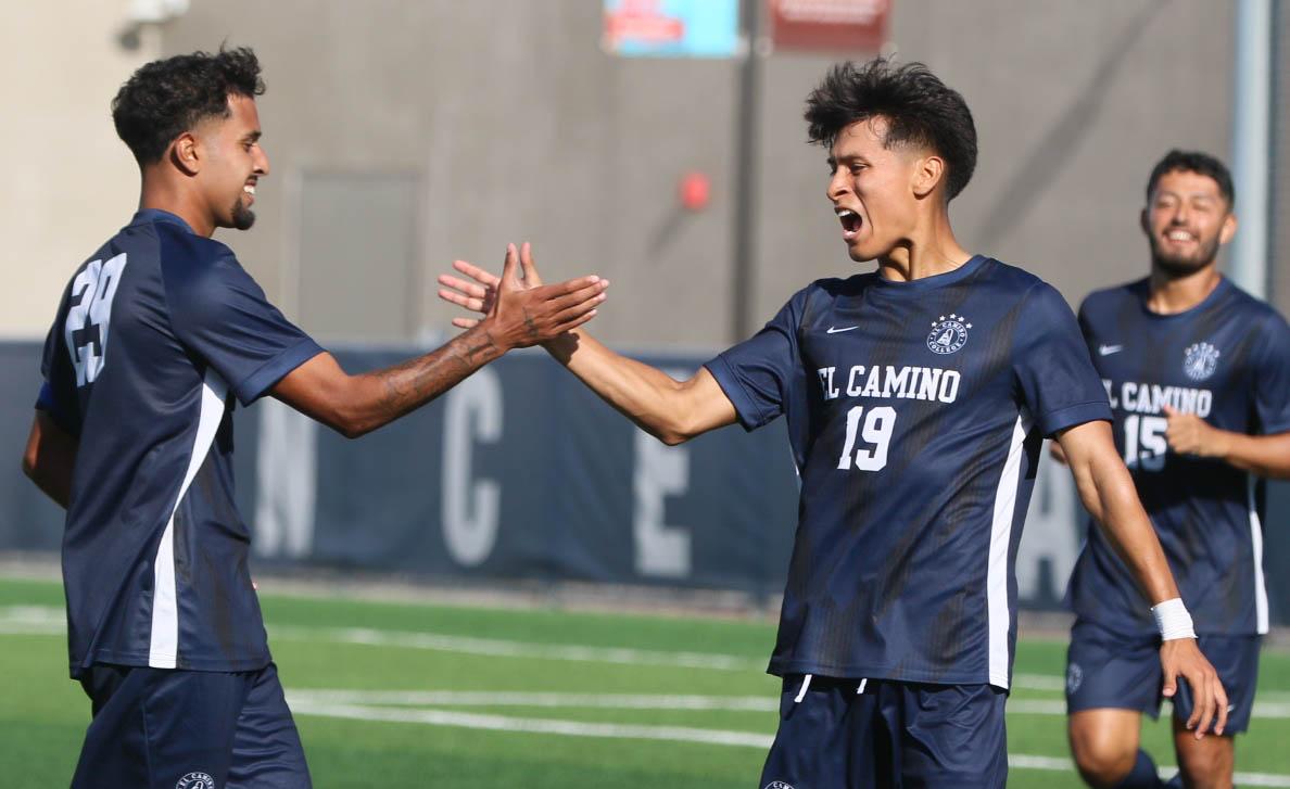 El Camino forward Steven Alvarenga (right) celebrates his goal with Marvin Gamez (left).  (Renzo Arnazzi | The Union}