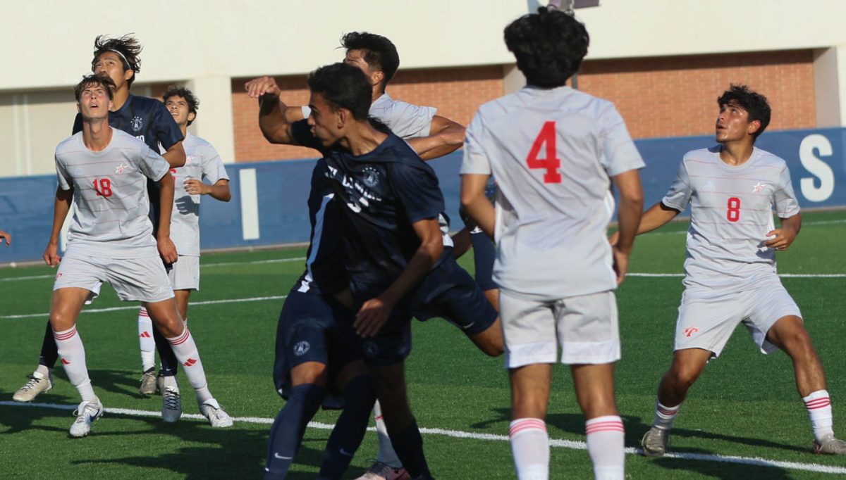 The El Camino Warriors and Palomar Comets scramble for the header during a home game against Palomar on Friday, Sept. 13. The Warriors defeated the Comets 5-1. (Renzo Arnazzi|The Union)