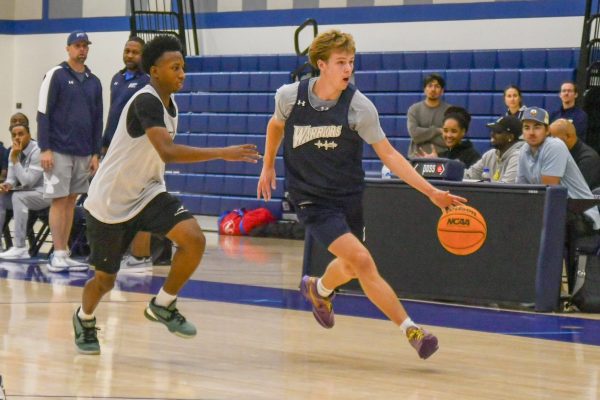 An El Camino defender goes for a rebound during a scrimmage match against GCU in the basketball gymnasium on Wednesday, Oct. 9. (Rosemarie Turay | The Union)