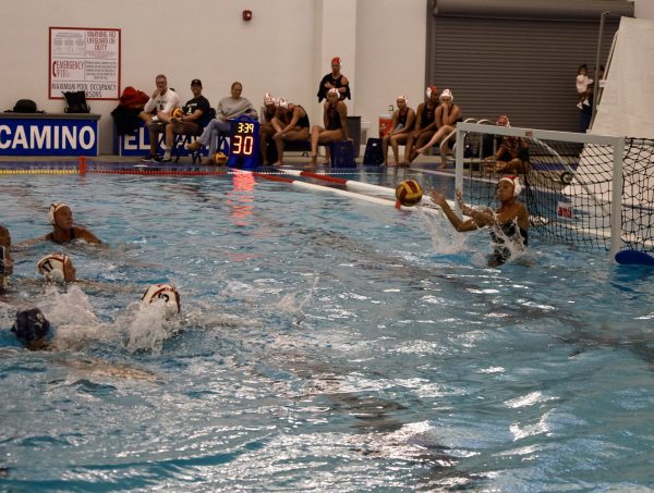 Long Beach City Vikings women's waterpolo goalie, Avery Reyes, intercepting the ball before it reaches the goal on Wednesday, Oct. 30, 2024. (Mario Trejos | The Union)