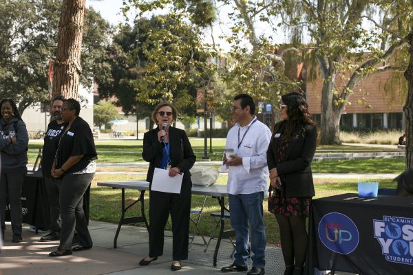 El Camino College hosts campus banner celebration on Oct 10. A member of El Camino gives speech at the event near the library. (Susana Reyes | The Union)