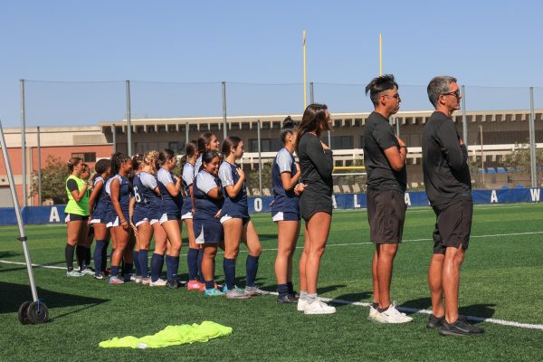 The "Star-Spangled Banner" plays before the match between the El Camino College Warriors (pictured) and the Long Beach City College Vikings on the ECC Soccer Field on Friday, Oct. 18, 2024. The Warriors ended the Vikings&squot; six-game winning streak with a tied score of 1–1. (Elsa Rosales | The Union)