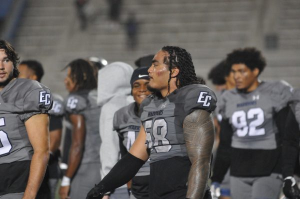 El Camino football player number 58 enjoys the spoils of victory despite facial injuries earned throughout the game- Taheem Lewis