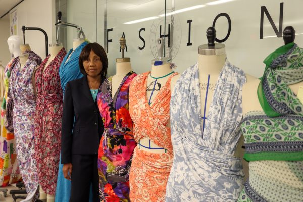 Fashion department coordinator and professor Vera Ashley stands next to mannequins in the Extensive Lab at the Industry and Technology Building on Oct. 22, 2024. Ashley Mendoza considers Ashley, a 17-year-veteran of the El Camino College fashion department, her mentor. (Eddy Cermeno | Warrior Life)