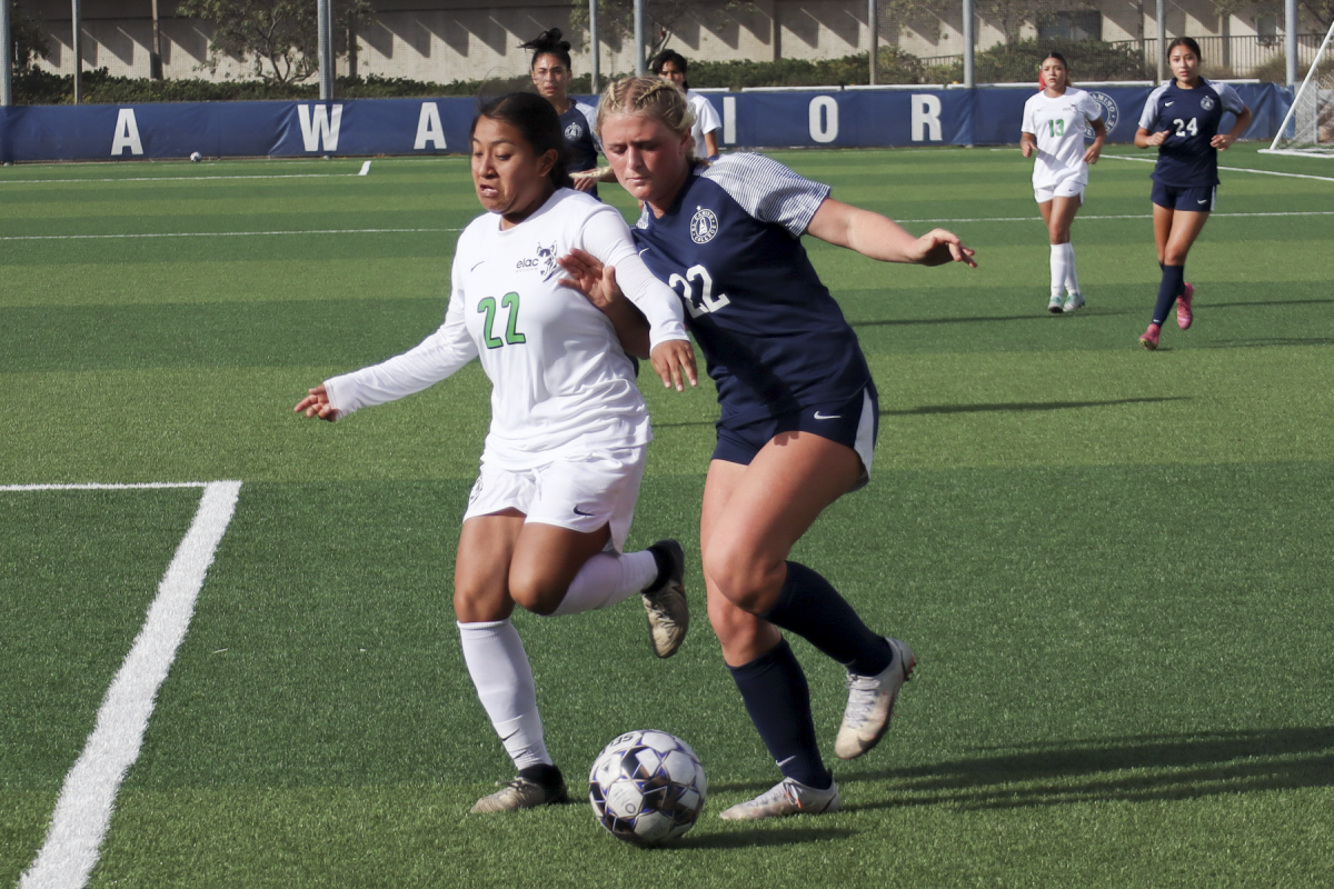 El Camino College Warriors defender Frankie McKinnon, right, and East Los Angeles College Huskies defender Veronica Diaz Chino contest each other for control of the ball near the Huskies’ penalty area during the women’s soccer match on Tuesday, Nov. 5. After leading 1-0 in the first half, the Warriors would win its final game of the regular season against the Huskies 6-0. The Warriors will play against the Cerritos College Falcons in the first round of the South Coast Conference Tournament on Friday, Nov. 8. (Eddy Cermeno | The Union)