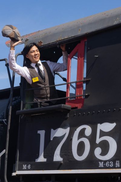 El Camino Student Richard Jalandoni poses in the Lomita Railroad Museum's Southern Pacific steam Locomotive. (Katie Gronenthal | The Union)