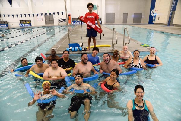 Students in the Adapted Swimming Class at El Camino College play with pool noodles on Oct. 15. (Angel Pasillas | Warrior Life)