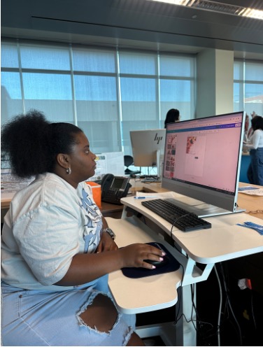 Frye works on Thanksgiving posters for the Distance Education Center at El Camino College Oct. 22. (Isabella Espat | The Union)