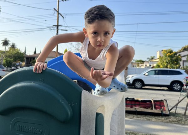 Moises "West" Cisneros, 5, practices his Spider-Man skills outside his home in Inglewood, Calif. on May 1, 2024. His mom, Guardian Scholar Cassandra Gonzalez will graduate from El Camino College on June 7, 2024 with certificates in paralegal studies and real estate. (Kim McGill | Warrior Life)