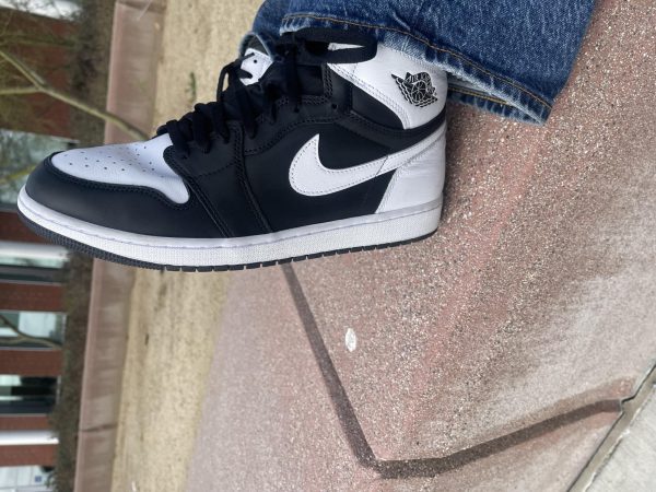 Ivry Alvarez, age 20, Respiratory Care major. Wearing the Air Jordan 1 Black White High OG.