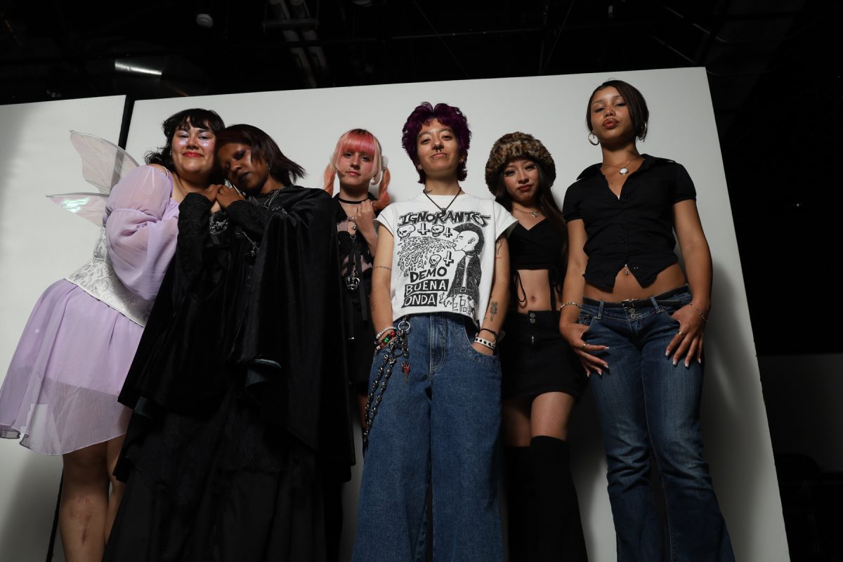 From left: Film major Bianca Ondatje, 22, fashion major “Slade” Davis, 21, undecided major Ray Chesterton, 18, film major Mason Alvarado, 18, radiology major Maria Cortez, 18, and cosmetology major Anaje Jolly, 19, pictured at El Camino's photo studio on Oct. 29. The students wore outfits representative of their styles, ranging from goth to office siren. (Angela Osorio | Warrior Life)