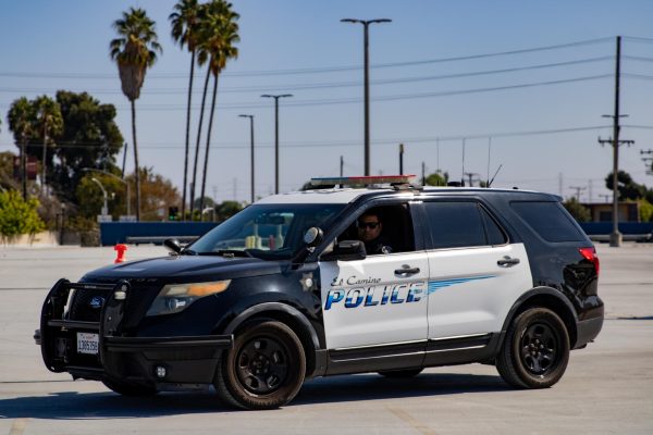 Officer Kenny Galan using El Camino Police Squad car in a state mandatory perishable skills training at the top of parking lot f on Sept 24. El Camino partnered with Gardena Police during this mandatory training. (Kayla Mitchell | The Union)