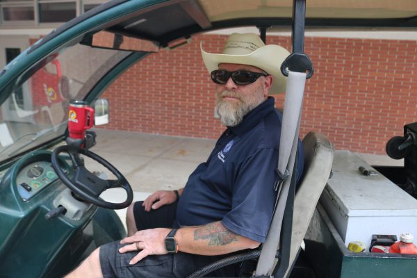 Locksmith Roy Dietz sits in his personal cart which carries his tools. Sept. 20, 2024. (Joseph Ramirez | Warrior Life)