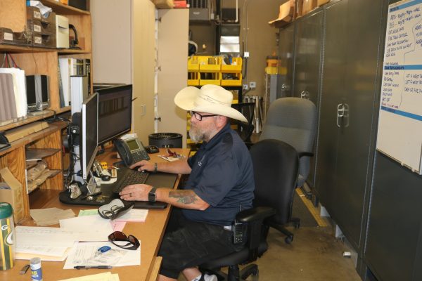 El Camino College Locksmith Roy Dietz works on his office computer in his office. Sept. 20, 2024. (Joseph Ramirez | Warrior Life)