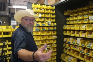 Campus locksmith Roy Dietz, 51, demonstrates one of his cabinets of lock parts in his office at El Camino College on Sept. 20. Dietz has worked at the college for over a decade, repairing locks and doors. (Joseph Ramirez | Warrior Life)