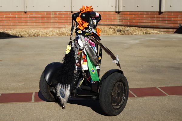 Tail the Segway covered in souvenirs that Alex Fleming has accumulated throughout the course of owning the Segway.