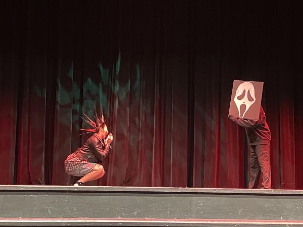 El Camino College cosmetology students pay homage to the 90&squot;s with the "do you like scary movies" scene from "Scream" as part of the 5th annual hair show on Dec. 4.