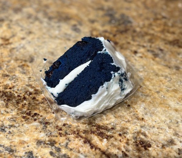 The blue velvet cake at Sweet Red Peach is a unique, soft bite topped with a sweet cream cheese frosting. (Savannah Anderson | The Union)