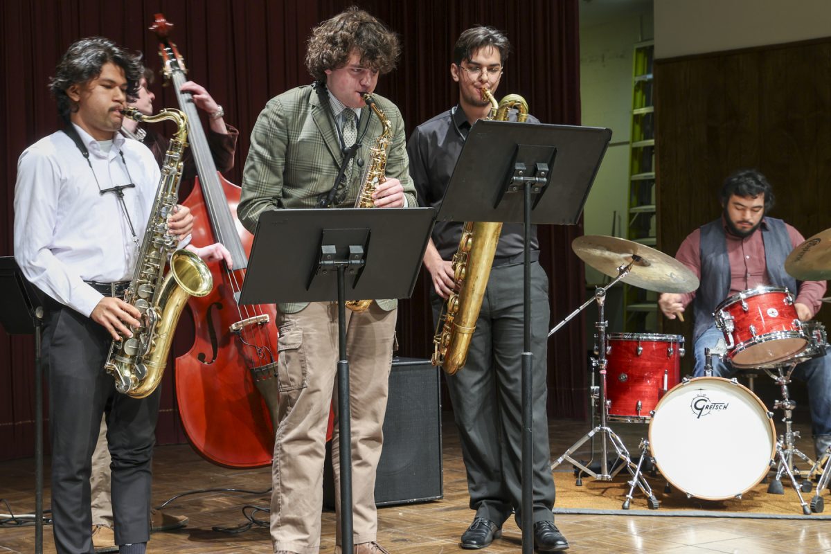 (L-R) Student Jazz sextet Alejandro Gonzales, Aidan Jennings, and Jacob Iverson, with Max Hughes on bass and Angel Alvarado on drums, perform "Sandu" by Clifford Brown at the Saxophone Master Class in the Haag Recital Hall on Thursday, March 6. (Erica Lee | The Union)