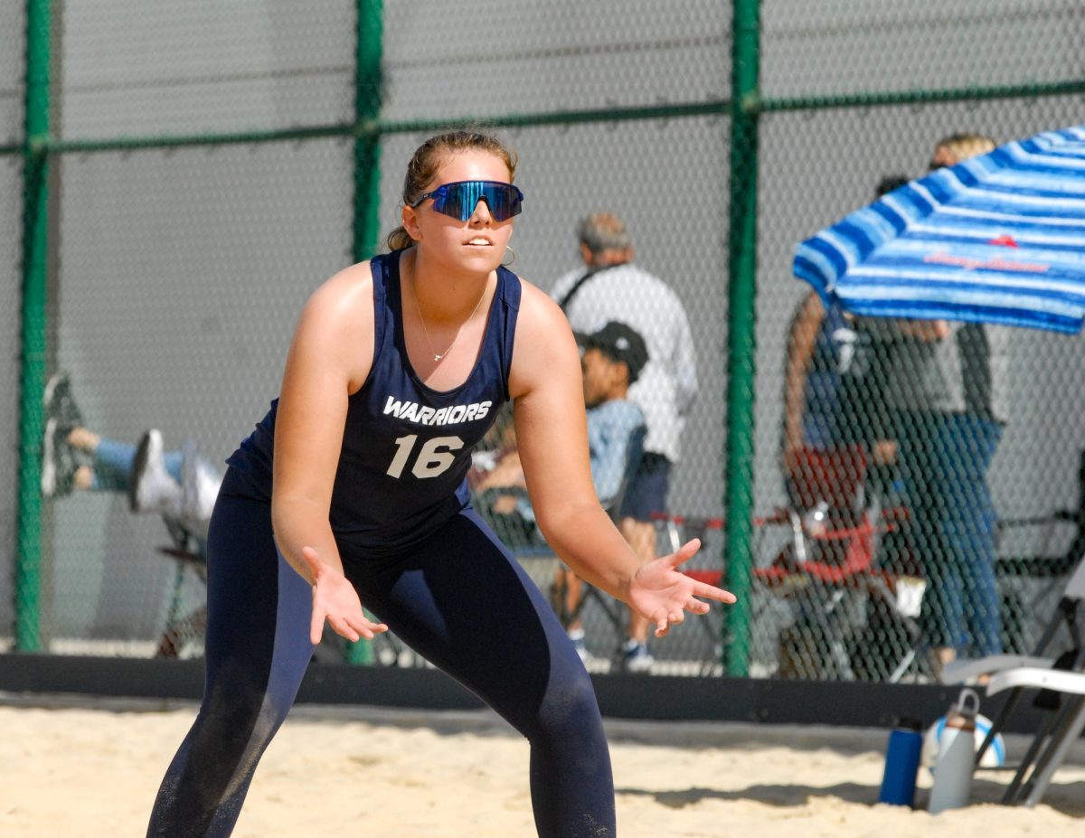 El Camino College Warriors player Madelyn Hancock stays on defense against the Mount San Antonio College Mounties on the ECC Sand Courts Friday, Feb. 28. The Mounties defeated the Warriors 3-2. (Osvin Suazo | The Union)