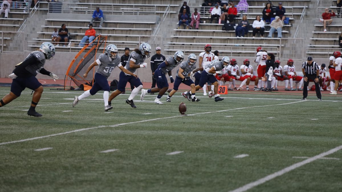 Warriors kicker Christian Miranda and the kickoff unit, set to kick the ball of the Chaffey Panthers.(Savannah Anderson | The Union)