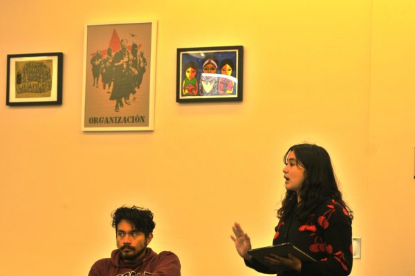 Music major Ellie (20) vocalizes her concerns regarding budget cuts during the I love the arts meeting held in the social justice center on October 24th. (Taheem Lewis | The Union)